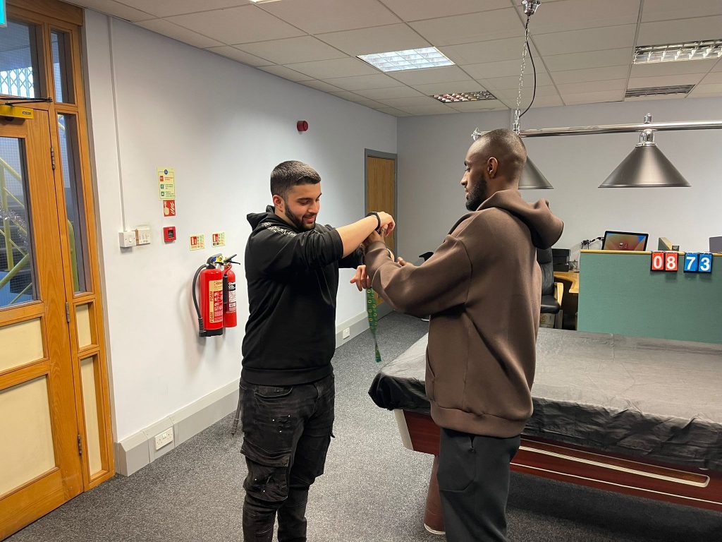 Handcuff use and restraint training in safe setting
